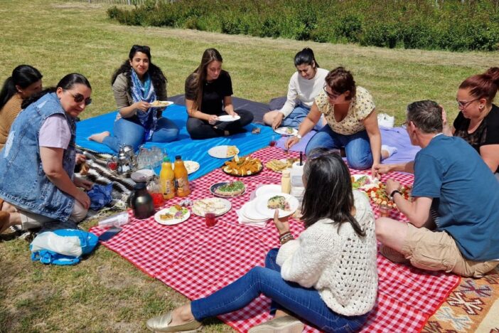 Mensen op een kleedje